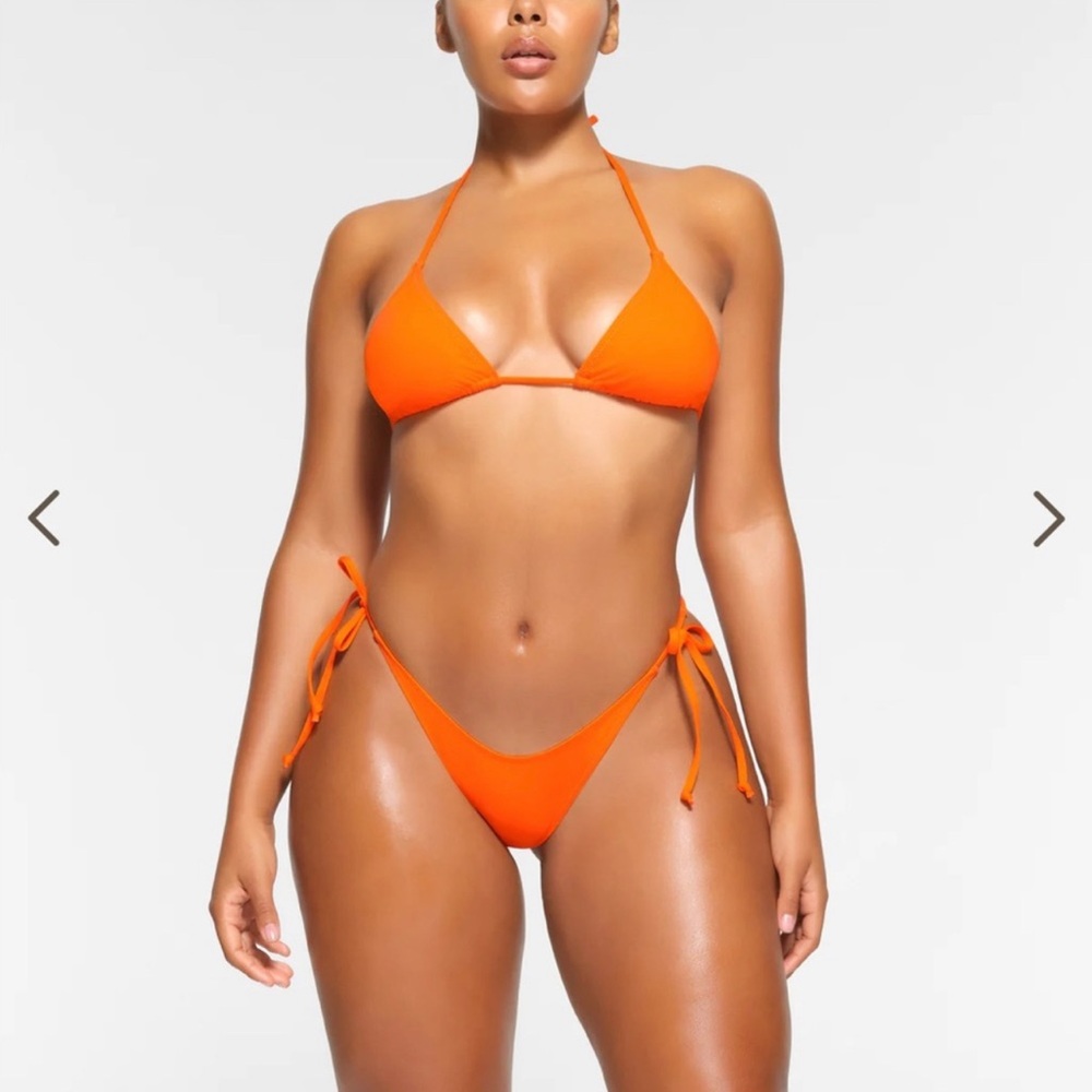 Skims swim signature triangle bikini top & bottom in limited edition color.